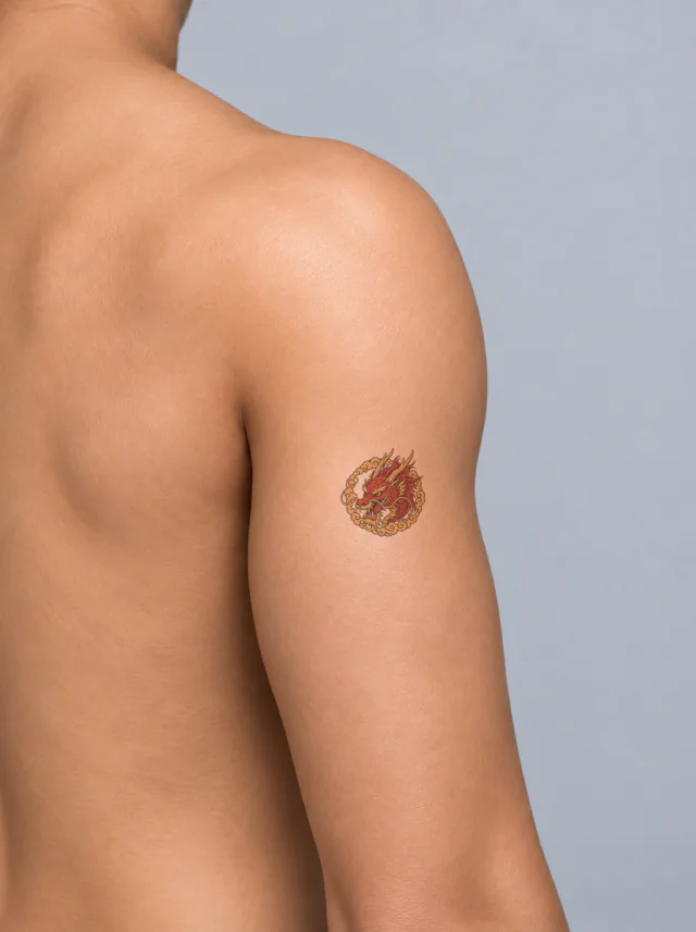 Red-And-Gold Japanese-Inspired Dragon Head with Flowing Whiskers and Cloud Ring Tattoo on-skin preview